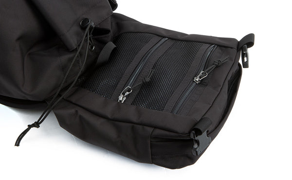 Close shot of the zippered compartments on the top flap of the Original Shadow Guide 31.
